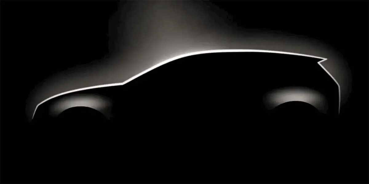 Primera imagen del nuevo Volkswagen Golf el&eacute;ctrico, destacando su dise&ntilde;o aerodin&aacute;mico y moderno en un entorno oscuro.