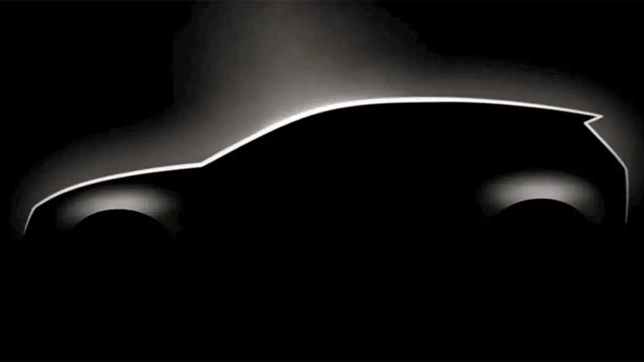 Primera imagen del nuevo Volkswagen Golf el&eacute;ctrico, destacando su dise&ntilde;o aerodin&aacute;mico y moderno en un entorno oscuro.